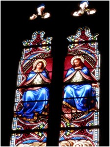 Stained window of Jesus and Mary Magdalene together as equals in local church.